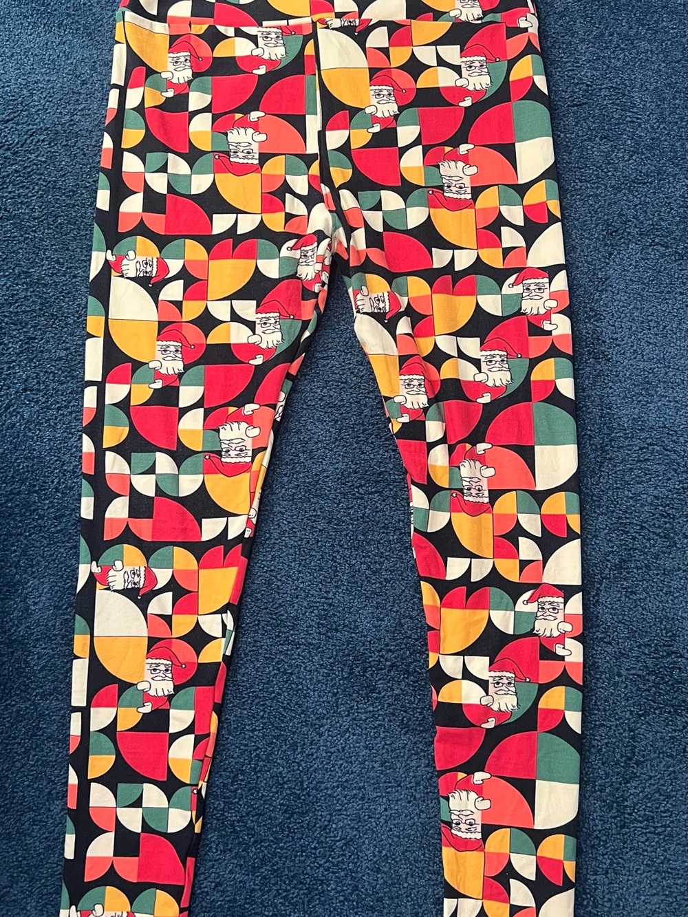 LuLaRoe Black Geometric Santa Print Leggings with Red, Yellow & Green Accents